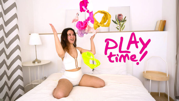 Sunny May plays with her wet fingers